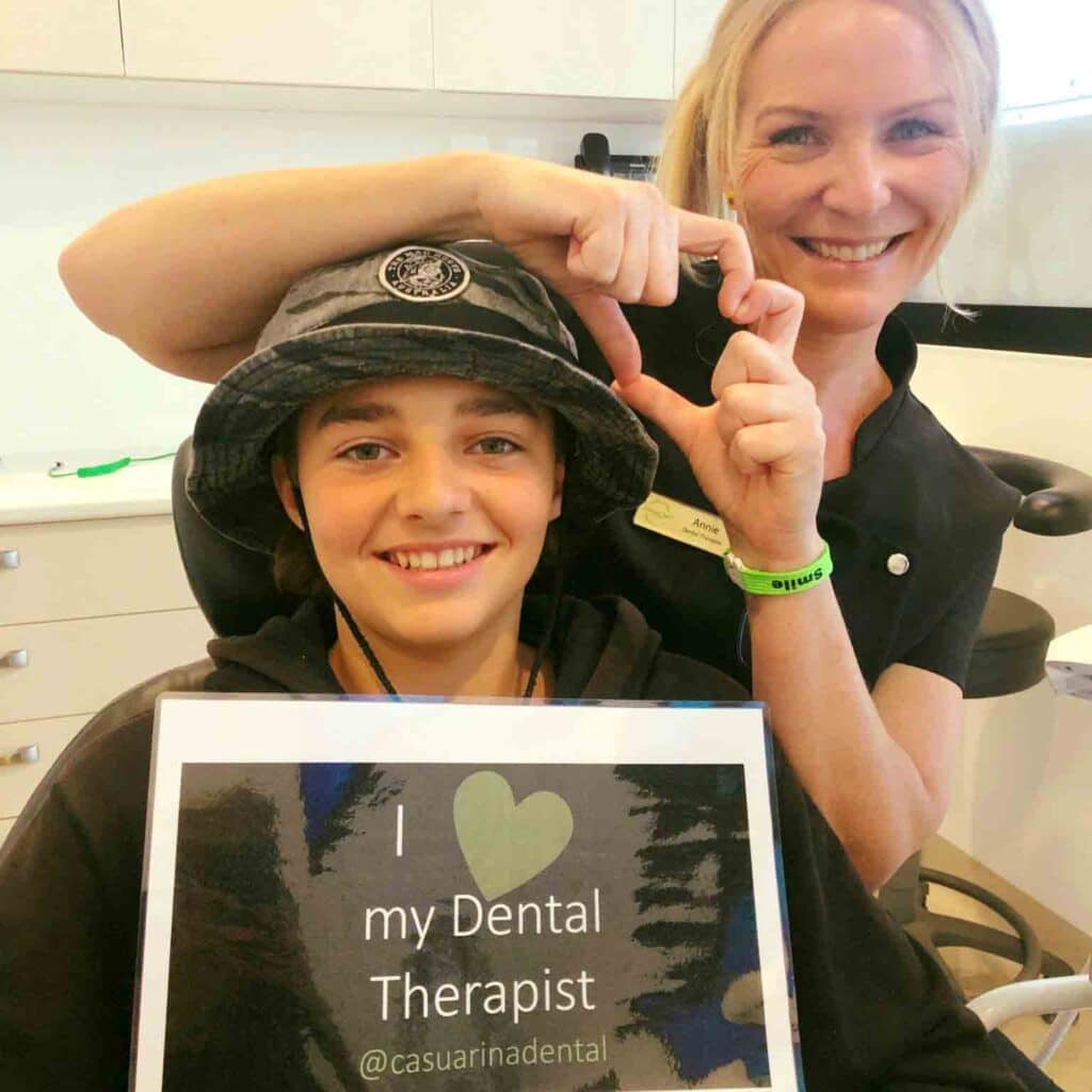 A Dentist And Patient Showing Appreciation