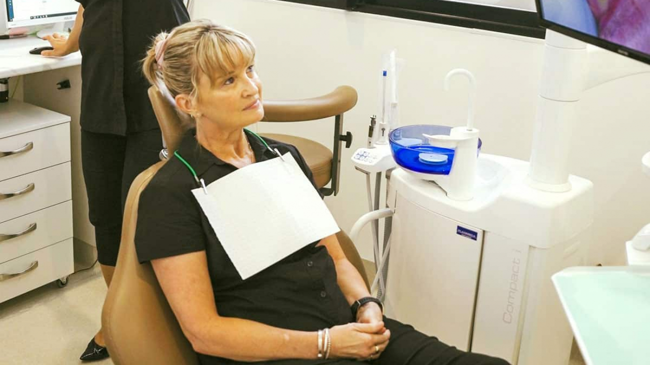 Dentist Showing An Image To The Patient
