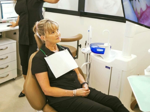 Dentist Showing An Image To The Patient