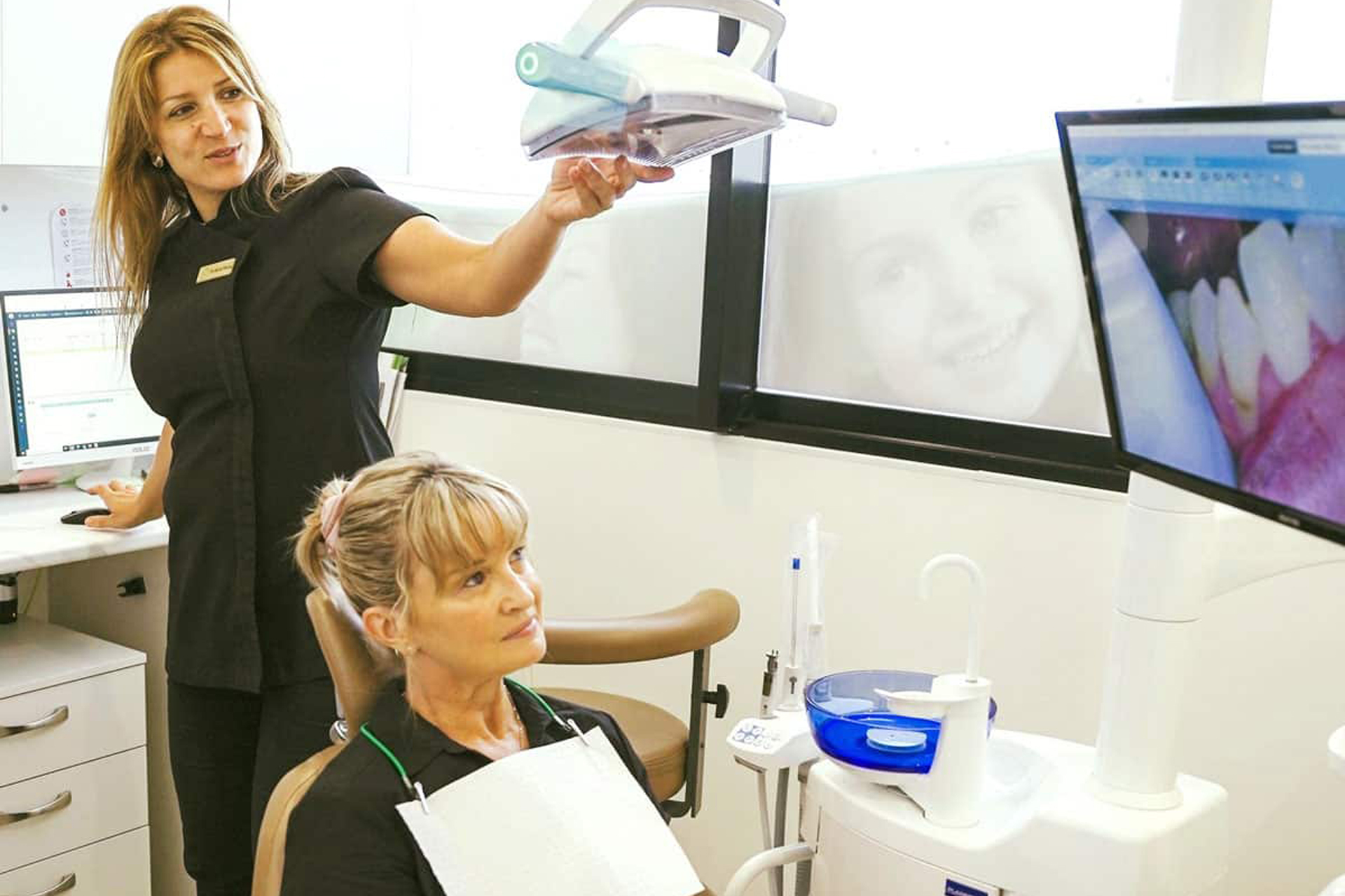 dentist-showing-an-images-to-the-patient.jpg