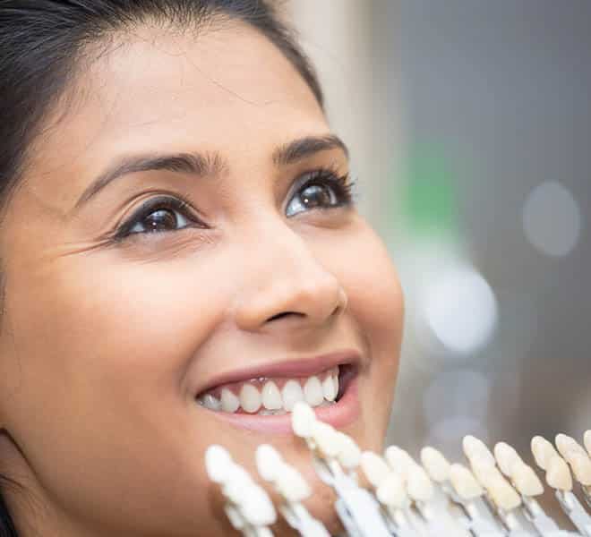 Closeup of Young Woman Getting Porcelain Veneers — Your Holistic Dentists in Casuarina, NSW