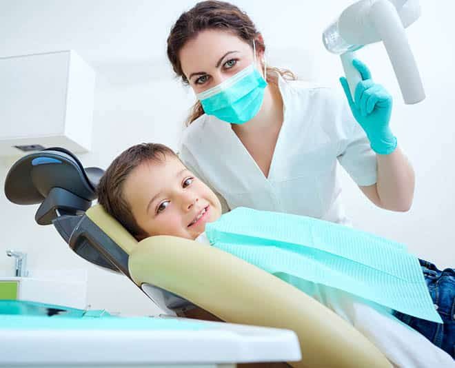 Kid Smiling After Dental Treatment — Your Holistic Dentists in Casuarina, NSW