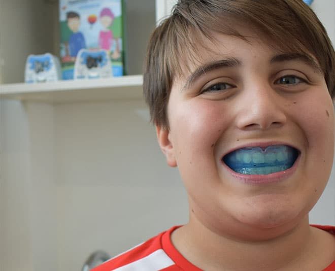 Kid Smiling with His Myobrace — Your Holistic Dentists in Casuarina, NSW