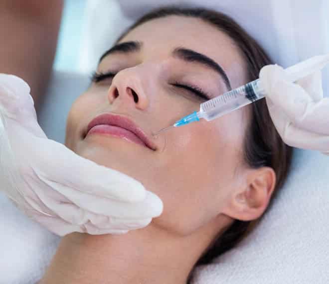 Woman Receiving Facial Injection Treatment — Your Holistic Dentists in Casuarina, NSW