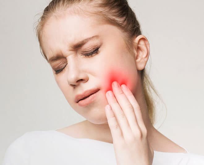 Woman Suffering From Sore Tooth — Your Holistic Dentists in Casuarina, NSW