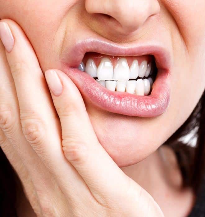 Woman with Tooth Pain — Your Holistic Dentists in Casuarina, NSW