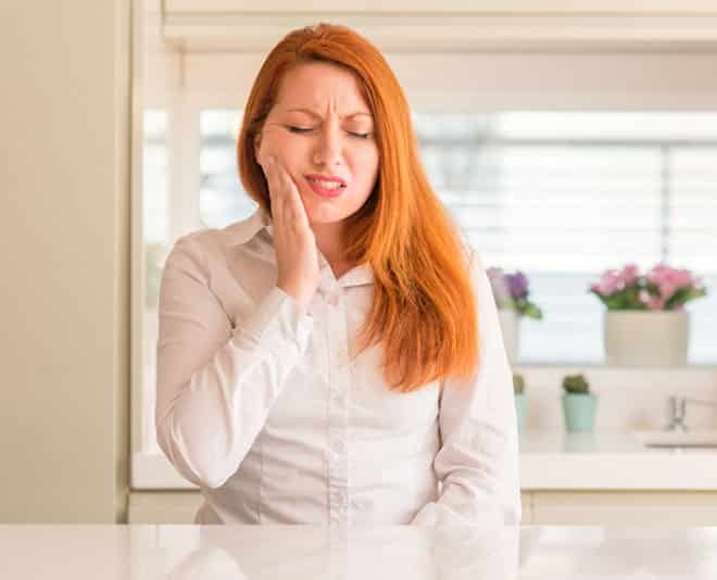 Woman with Toothache — Your Holistic Dentists in Casuarina, NSW